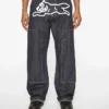 Selvedge-denim-carpenterbukser med løpende hund