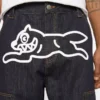 Selvedge-denim-carpenterbukser med løpende hund